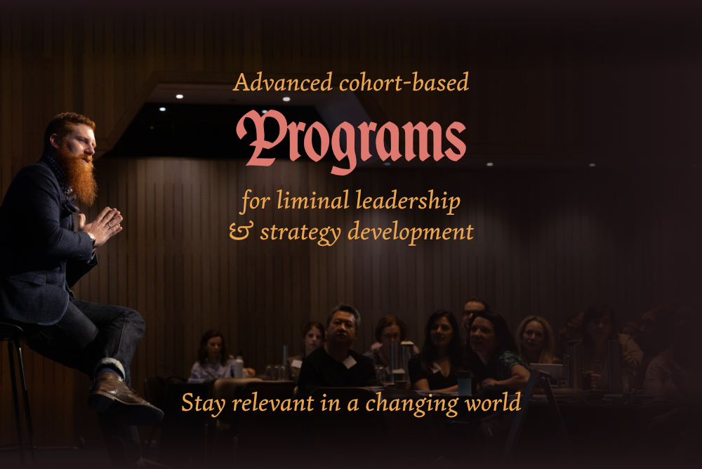 Advanced cohort-based programs for liminal leadership & strategy development. This image shows Dr. Jason Fox speaking to a group of leaders. Stay relevant in a changing world.